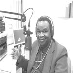 Dr. Léopold Kumbakisaka au cours d'une présentation des informations. Radio-Canada (Journa ...