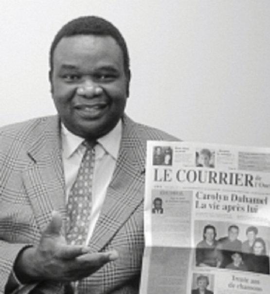 A la sortie de mon journal, le Courrier de l'Ouest, Dr. Lopold Kumbakisaka diteur-Directeur , Canada 2003